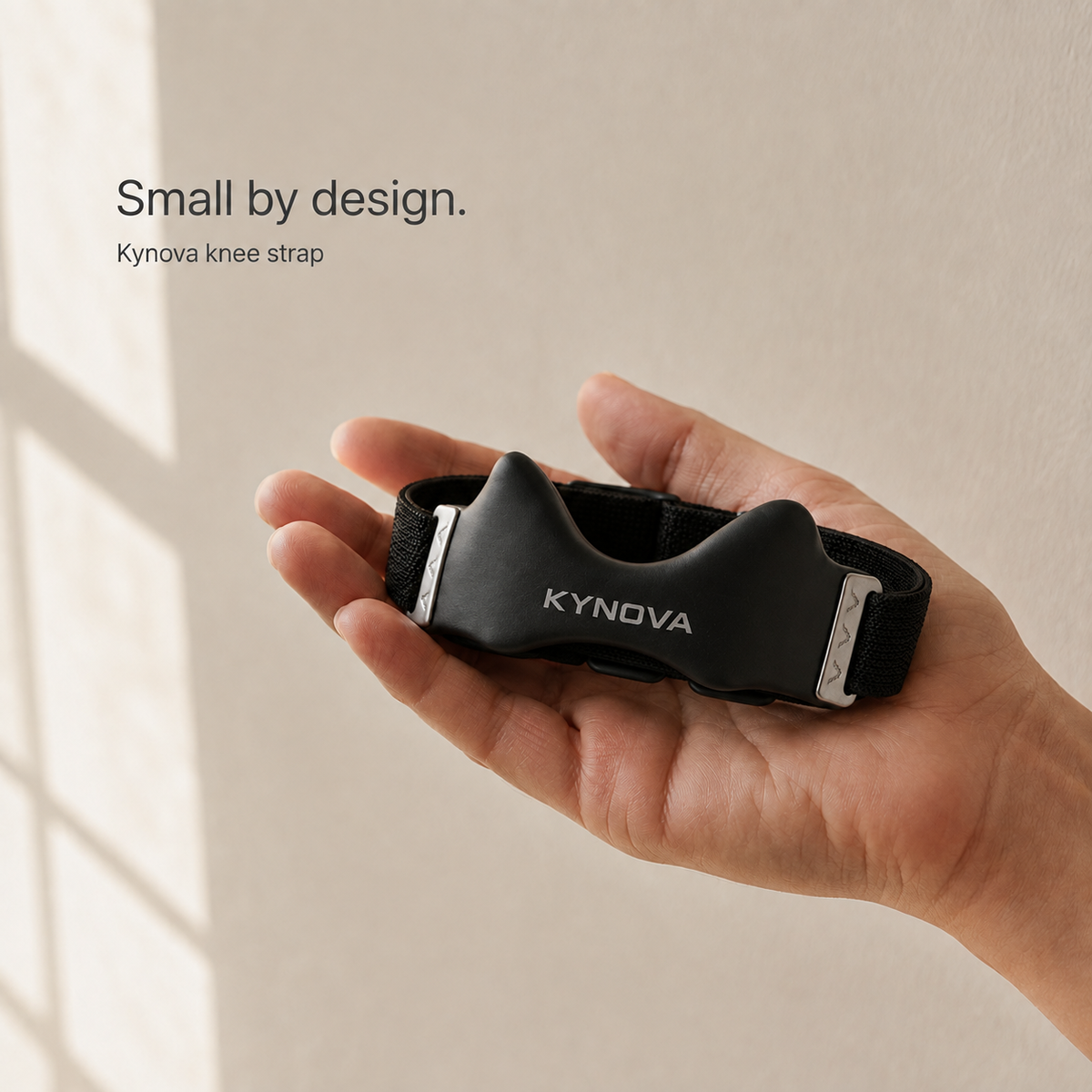 Kynova knee strap held in a hand